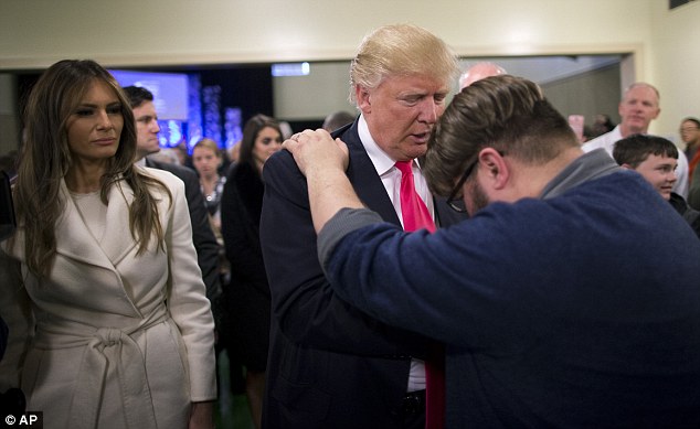 laying hands on trump in prayer